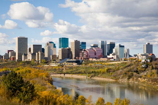 Edmonton -capital of Alberta on North Saskatchewan River during a blue sky day.