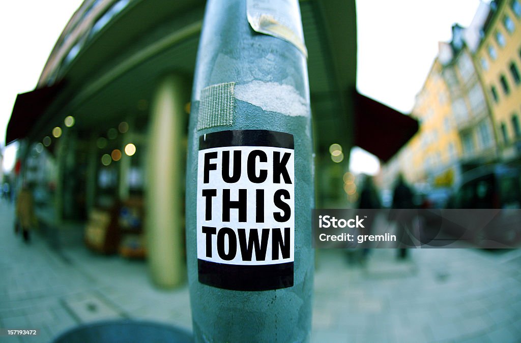 This town A warm and welcoming message on a lamppost, taken with a fisheye lens and small dof. Poster Stock Photo