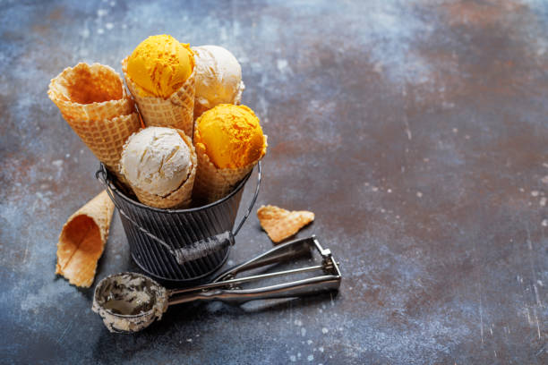 istock Assorted ice cream flavours in delightful waffle cones 1571937172