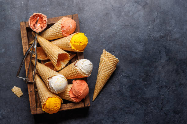 istock Assorted ice cream flavours in delightful waffle cones 1571938812