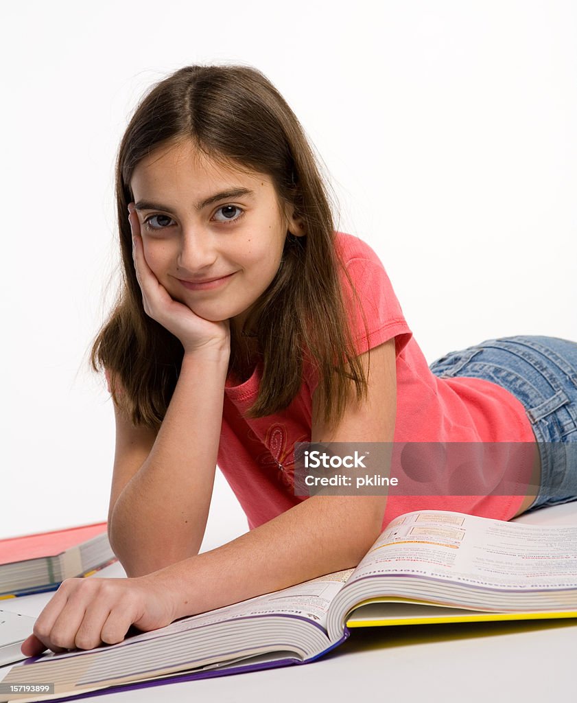 Nastolatka robi Zadanie domowe - Zbiór zdjęć royalty-free (Białe tło)