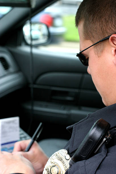 istock Police Officer Writing Ticket Vertical 157193922