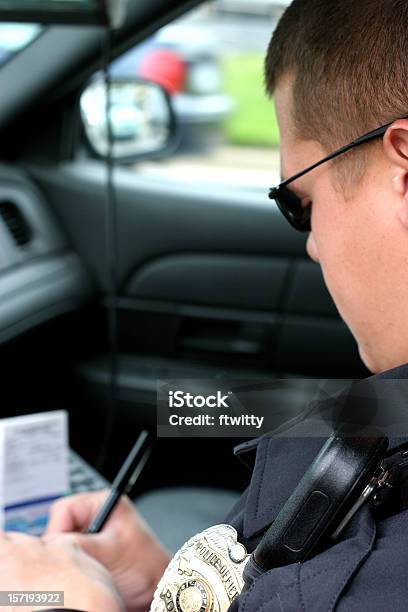 Police Officer Writing Ticket Vertical Stock Photo - Download Image Now - Community Outreach, Police Force, Adult