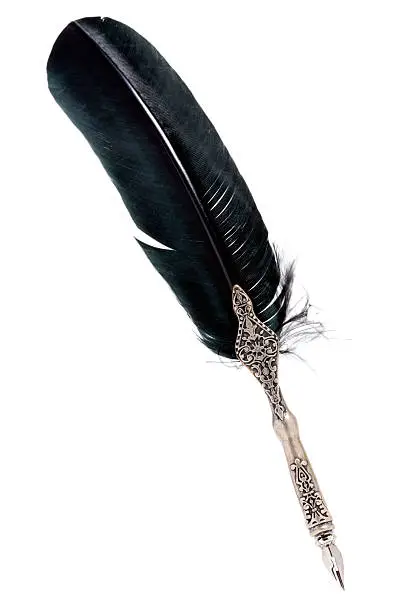 Decorative Venetian feather quill with intricate silver carving.