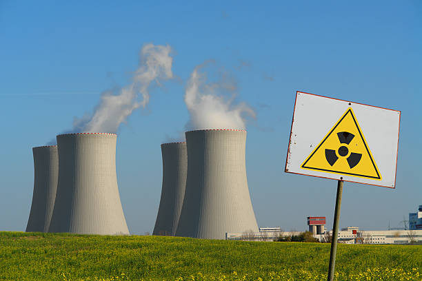 Nuclear Power Plant with Radioactivity Sign stock photo