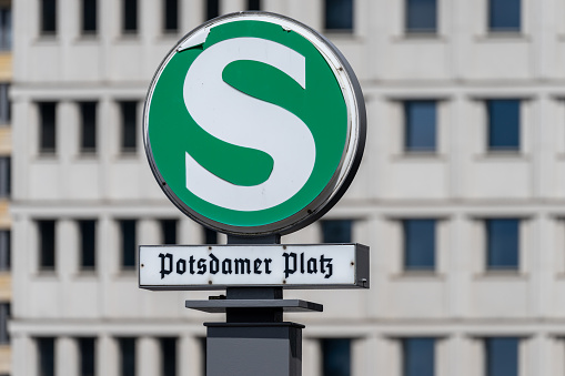 Subway station sign Potsdamer Platz against building, Berlin Potsdamer Platz