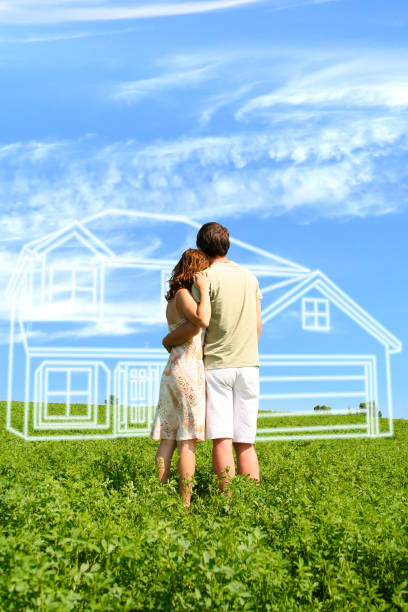 Young couple dreaming about a house stock photo