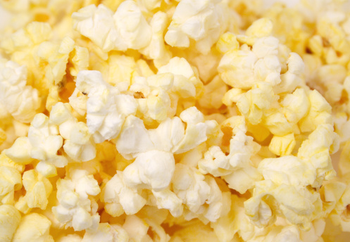 Close up shot of buttered popcorn.
