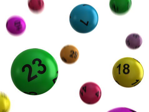 Lottery balls of different colours. 3D render with HDRI lighting and raytraced textures.