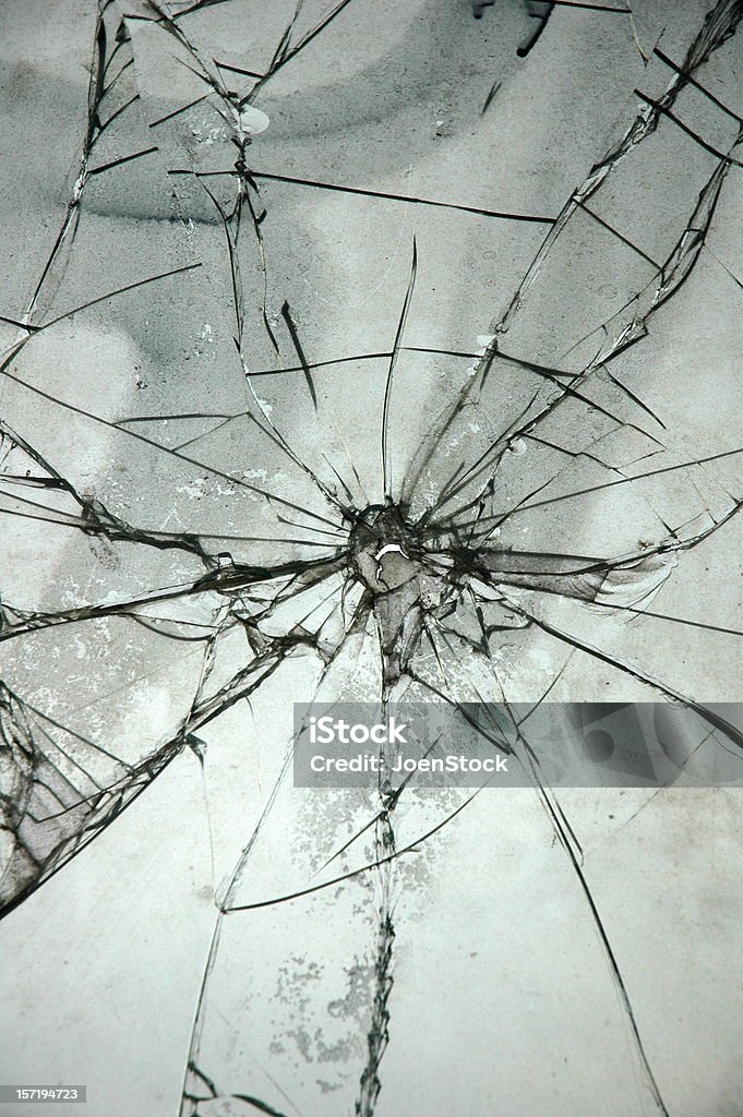 Bullet Hole  Shattered Glass Stock Photo