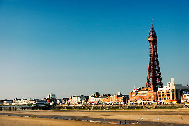 Blackpool Tower. the promenade and the sandy beach, Lancashire, UK stock photo