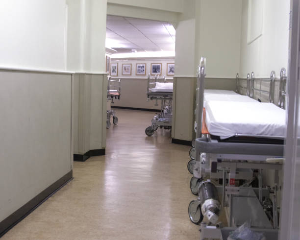 istock Hospital corridor with gurneys 157195018