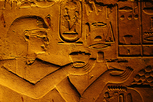 Egyptian hiearoglifs on the wall of Luxor temple