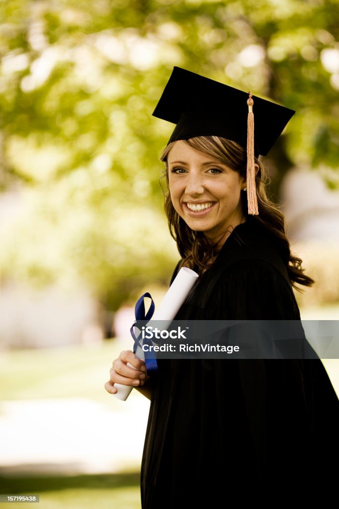 Beautiful Graduate Portrait of a recent college graduate. Achievement Stock Photo