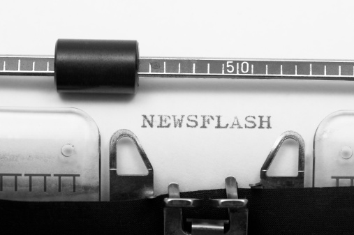 NEWSFLASH in old typewriter