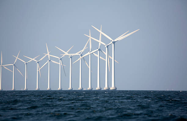 istock A line of wind turbines at an off-shore wind farm 157195568