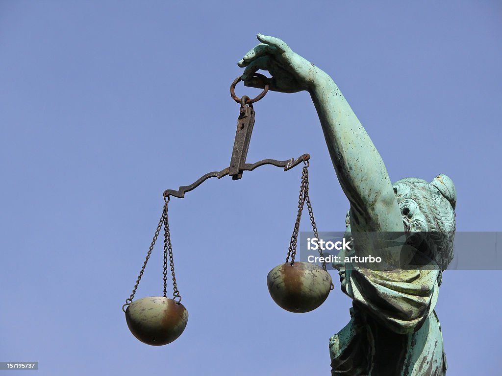 Justicia portrait from left 300 year old statue of Lady Justice overseeing the Well of Justice  at Frankfurts Roemer Square / Germany, Adult Stock Photo