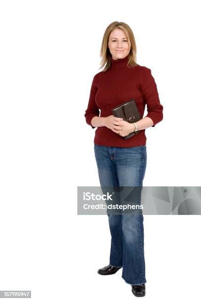 Mujer Joven Con Libro De Cuerpo Completo Foto de stock y más banco de imágenes de Adulto - Adulto, Adulto joven, Agarrar