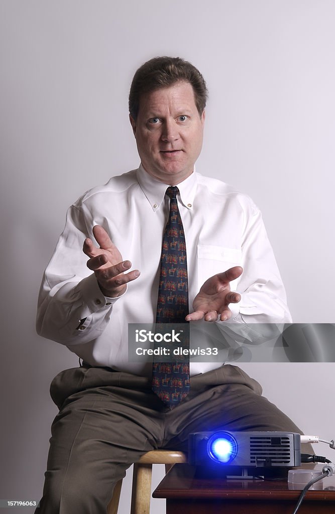 Businessman With Projector Doing Presentation  Only Men Stock Photo