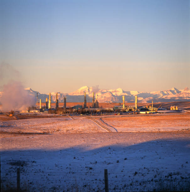 istock Gas Plant at Sunrise with Mountains 157196270