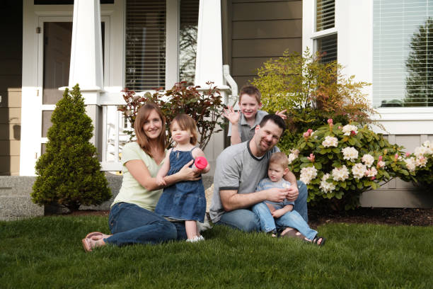 istock Family of five in the grass 157196713