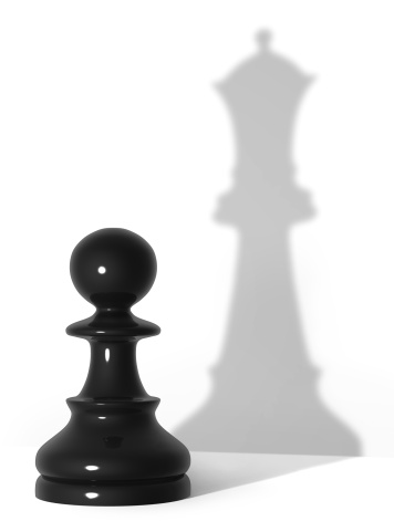 Black pawn with queen's shadow. Represents conception of: advancement, growth, progress, evolution etc.