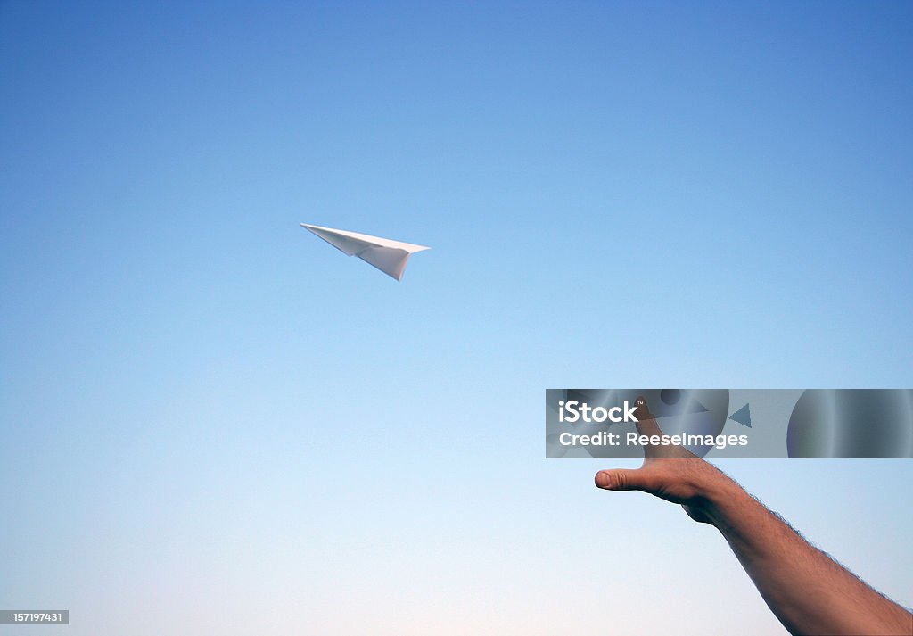 Throwing a Paper Airplane  Airplane Stock Photo