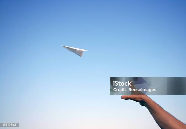 Throwing A Paper Airplane Stock Photo - Download Image Now - Airplane, Paper Airplane, Paper