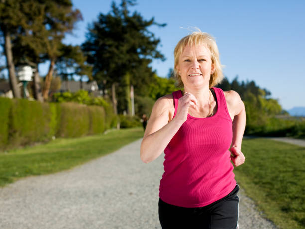 istock Active Mature Woman Running 157197473