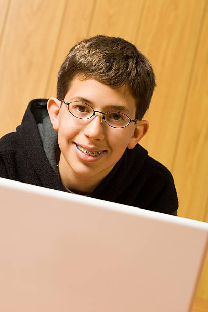 istock Teen working on Laptop 157197495