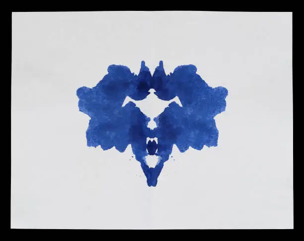 Photo of Traditional Rorschach Inkblot, blue ink on paper used