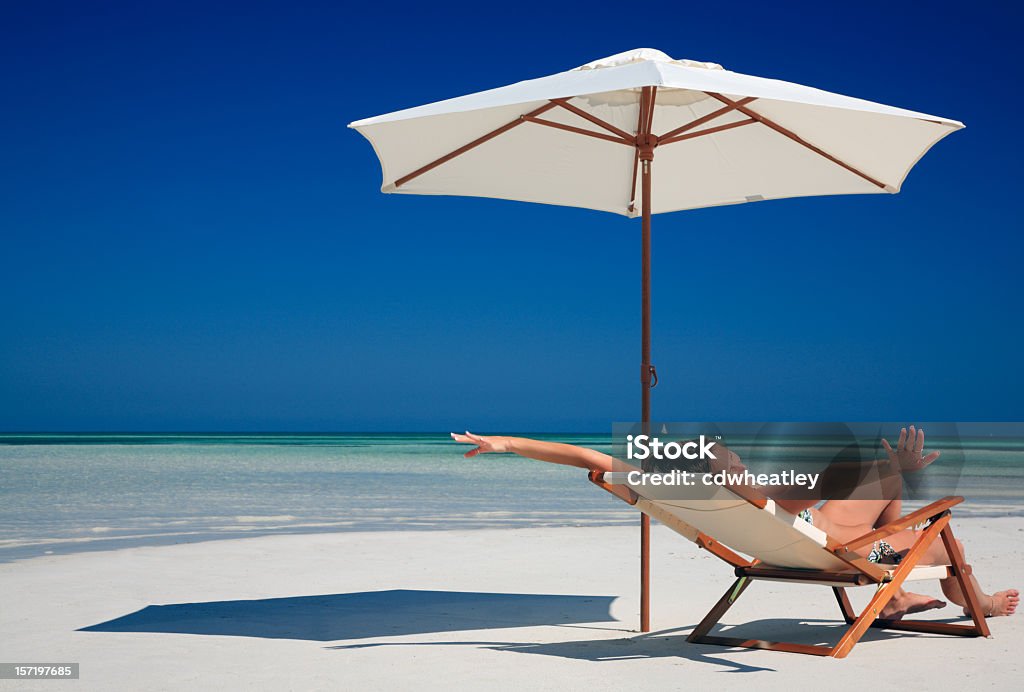 Szczęśliwa Kobieta na plaży - Zbiór zdjęć royalty-free (Florida Keys)
