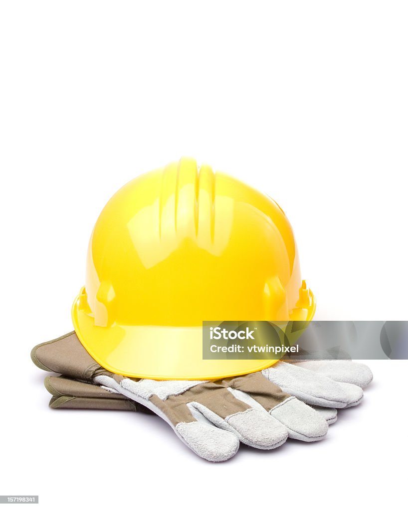 Casco di costruzione con i guanti - Foto stock royalty-free di Scontornabile