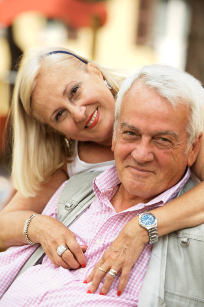 istock Cherful senior couple in the park 157198441
