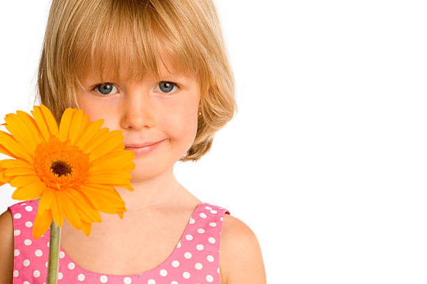 istock Little Girl Holding Flower 157198736