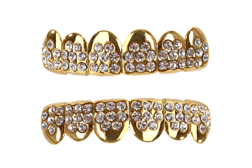Gold teeth with diamonds.