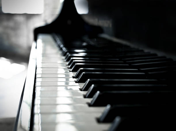 istock Classic grand piano keyboard close-up 1571990200