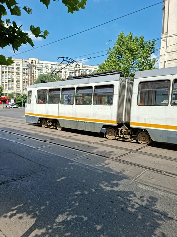 Bucharest with an old cable car. The image was made in the city center, captured during summer season.
