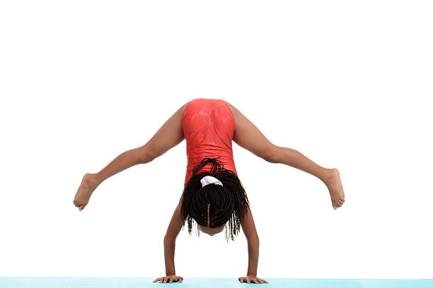 istock Young child trying to do handstand 157200810