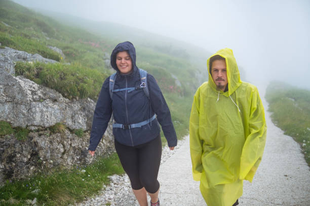 istock Extraordinary hike in the misty weather 1572018468