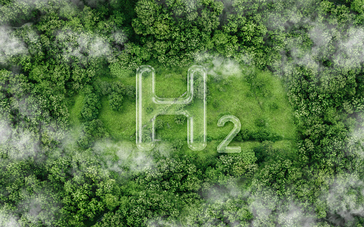 H2 symbol on the green in the forest. Green Energy Hydrogen or eco-technology Renewable Clean energy. Hydrogen's environmental friendliness and Potential as a future fuel.H2 hydrogen innovation.