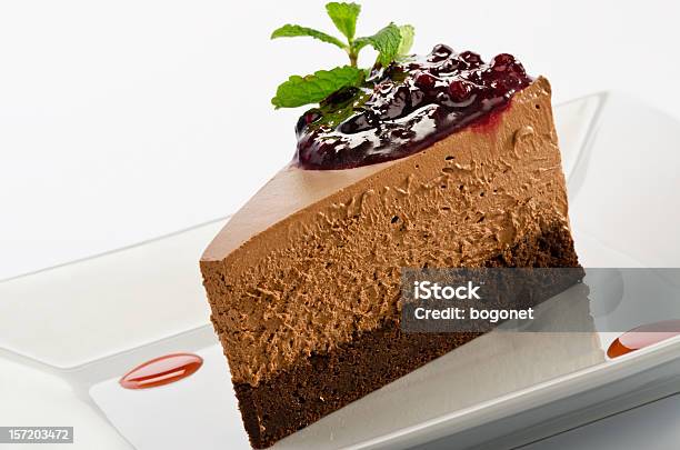 Chocolate Layered Mousse Cake With Dark Cherries Stock Photo - Download Image Now - Baked Pastry Item, Baking, Brown