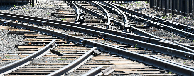 Train tracks crossing in train station