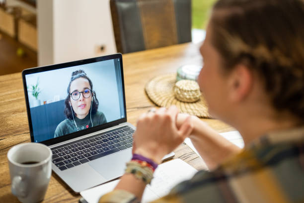 istock Woman discussing during video conference 1572059004