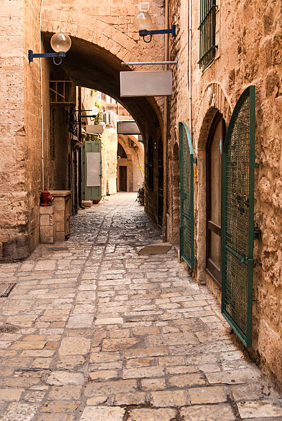 A street in Jerusalem Old City, Israel. During Easter week, the city is very crowded and local people, tourists and pilgrims from everywhere participate in masses , processions and acts of faith.