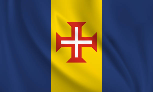 istock Waving flag of Madeira blowing in the wind. Full page flying flag 1572084457