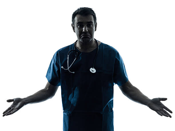 istock ignorant doctor man silhouette portrait 157209373