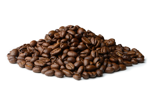 Heap of coffee beans isolated on white