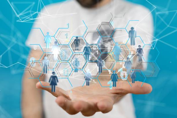 istock Person representing network connections, demonstrating the power of modern technology 1572129587