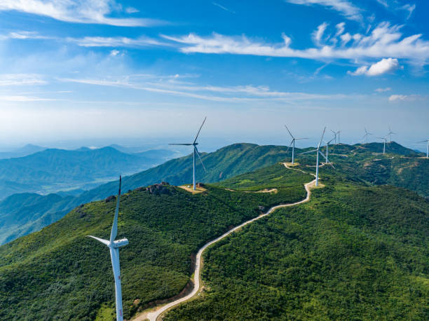 istock Wind farm on the mountain, blue sky and white clouds 1572133253
